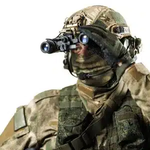 Camouflaged soldier looks through advanced ir vision goggles for target identification and movement tracking