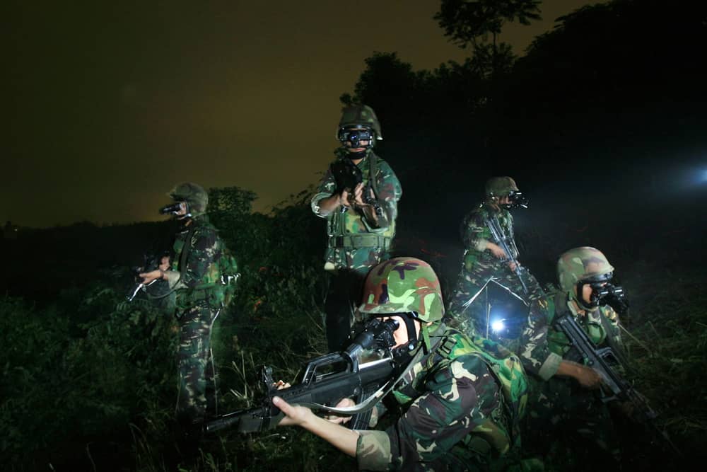 Soldiers wearing NVGs to get the best night vision for flying